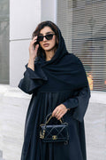 Front view of Black Color-Block Abaya Coat with modern wave-edged cutting