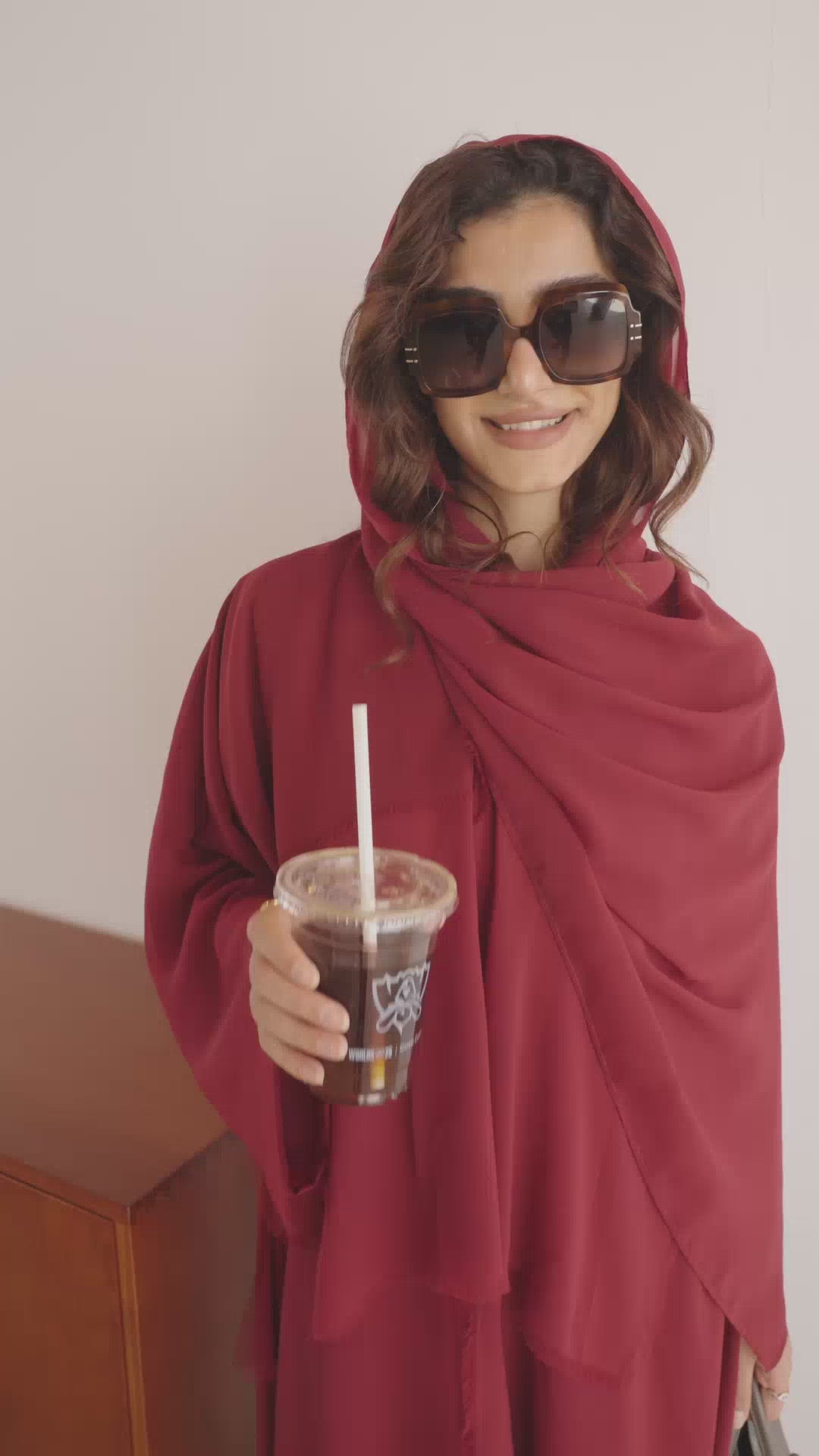 Close-up of Bright Red sheer fabric and decorative tassels